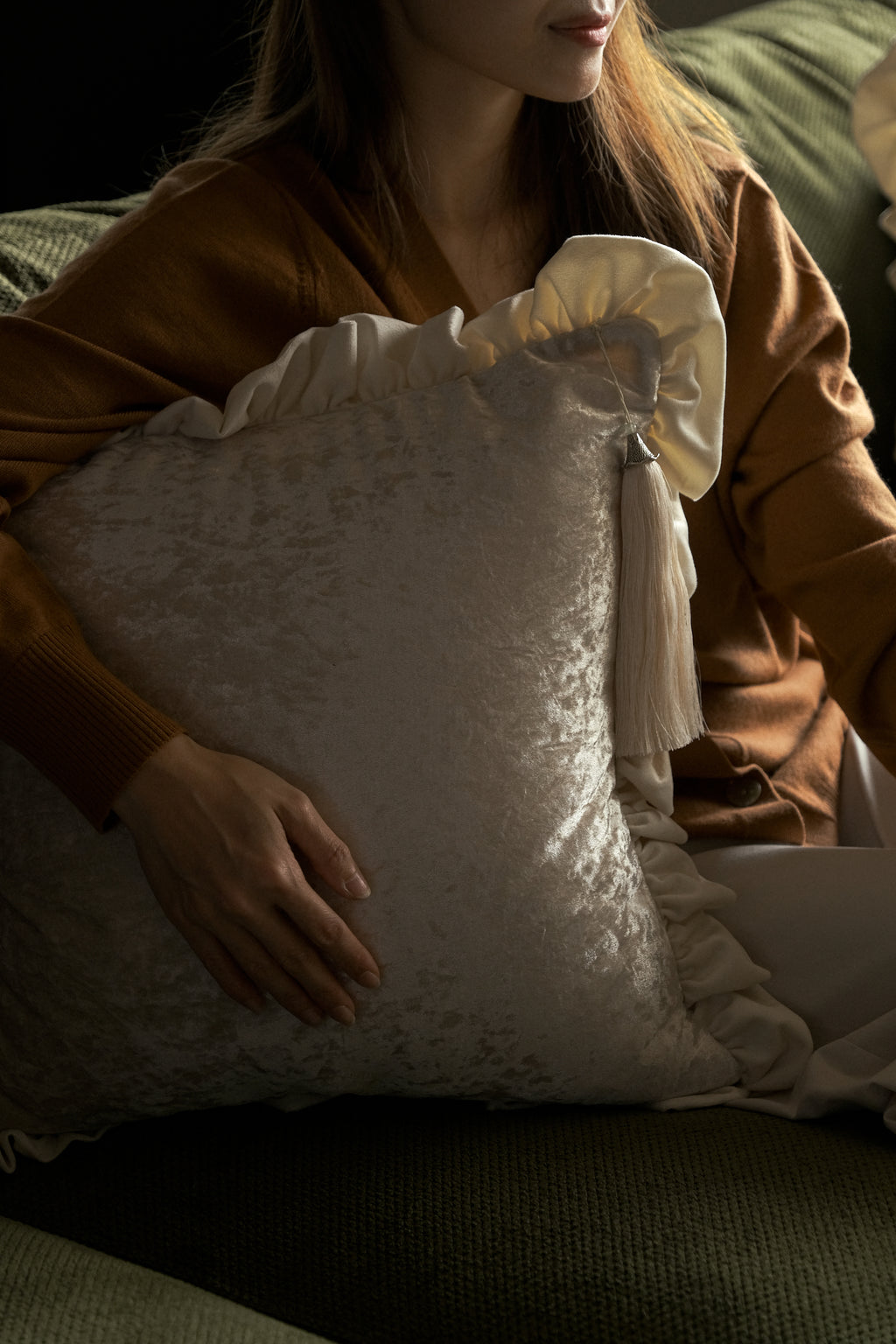 Decorative scented cushion emphasising deep relaxation and luxurious comfort.