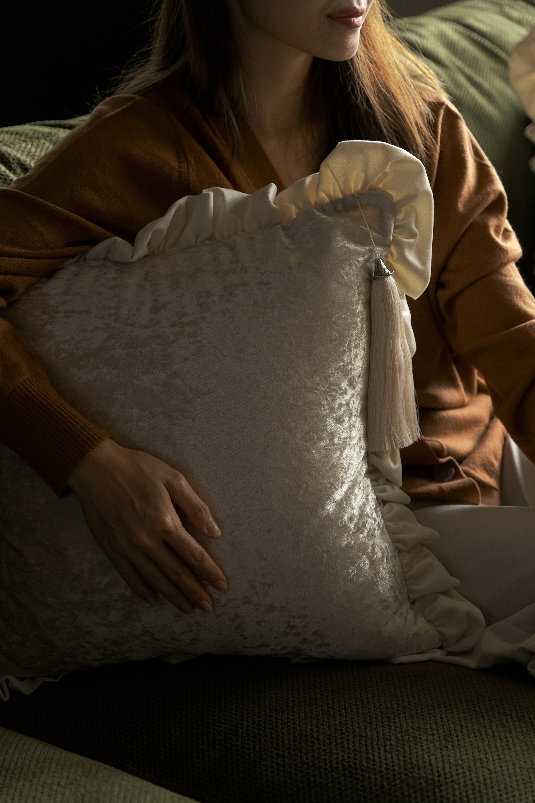 Decorative scented cushion emphasising deep relaxation and luxurious comfort.
