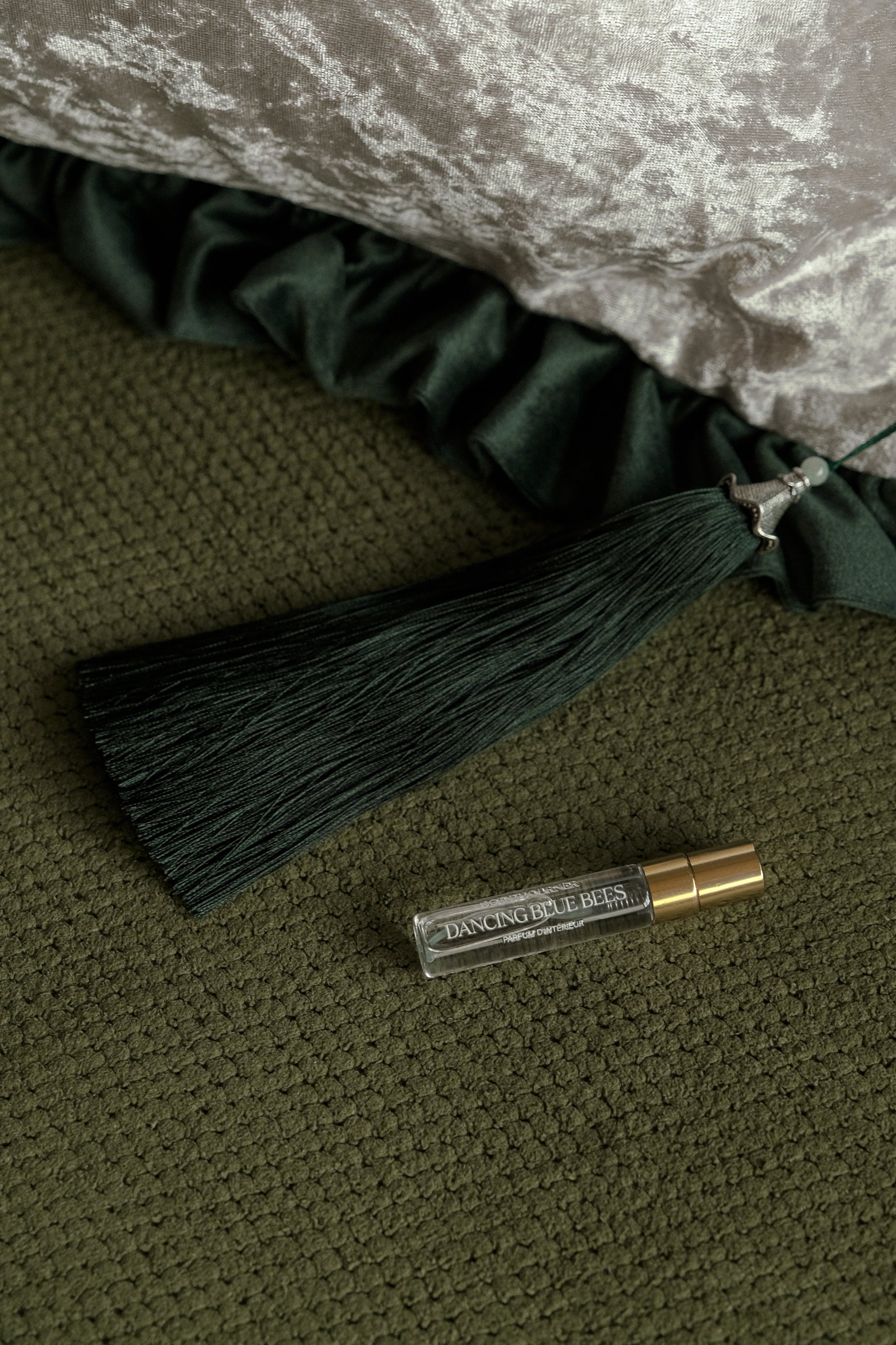 Beeyarnd x Scent Journer scented throw cushion – hunter-green velvet accent pillow.