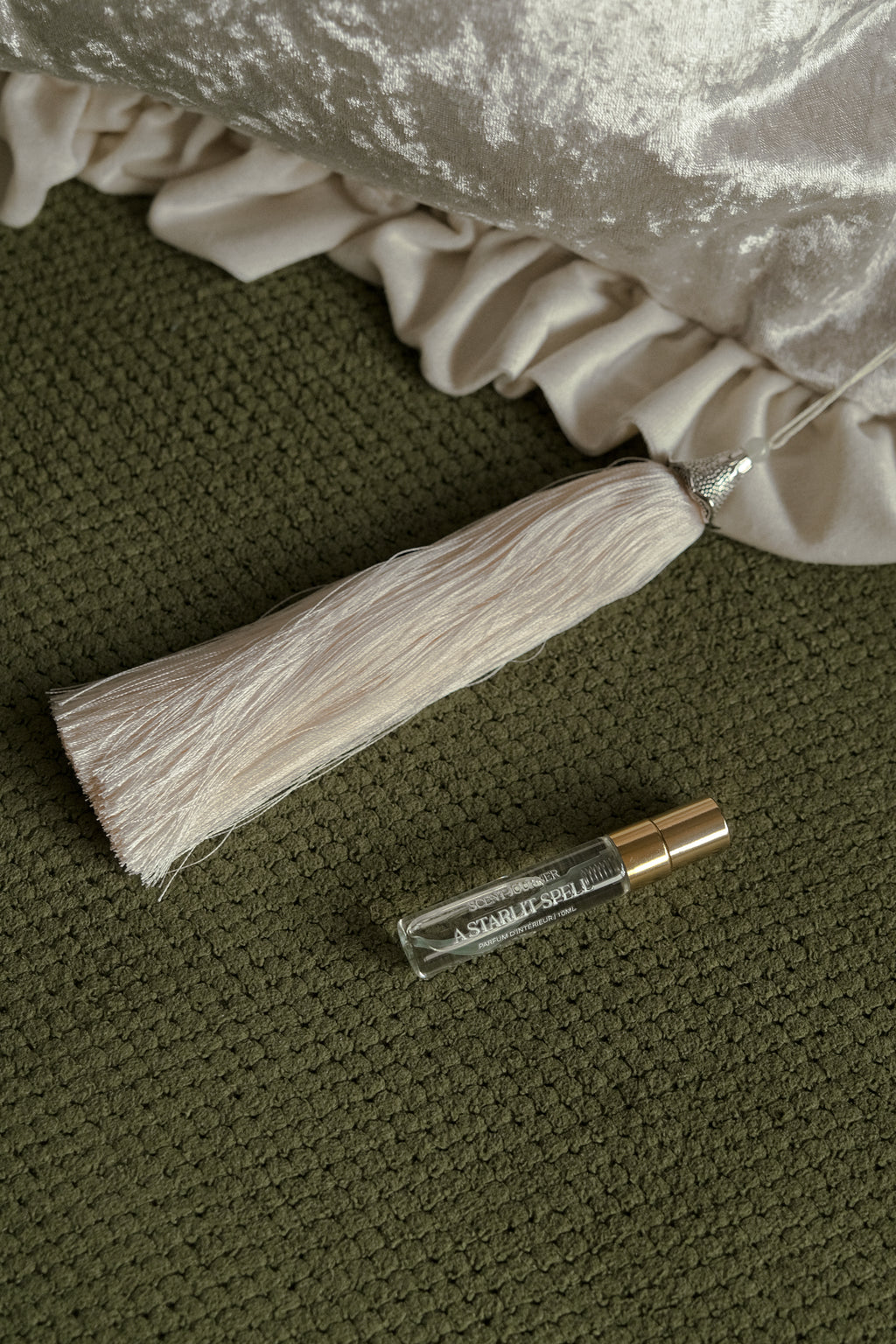 Close-up of luxurious velvet texture on scented throw cushion, Beeyarnd x Scent Journer.