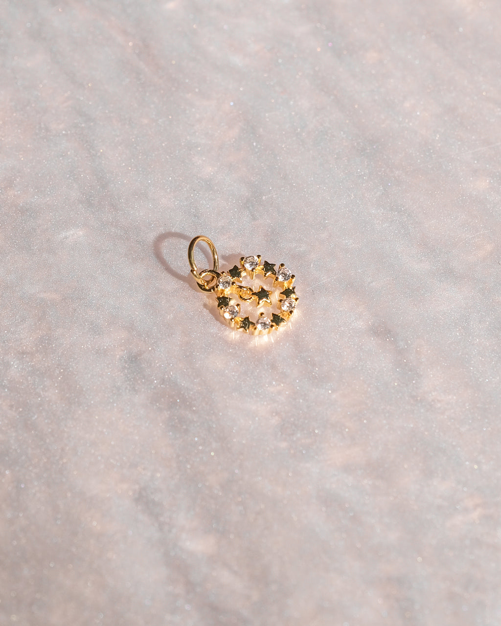 Exclusive charm with limited edition pendant designed for luxury handbags.