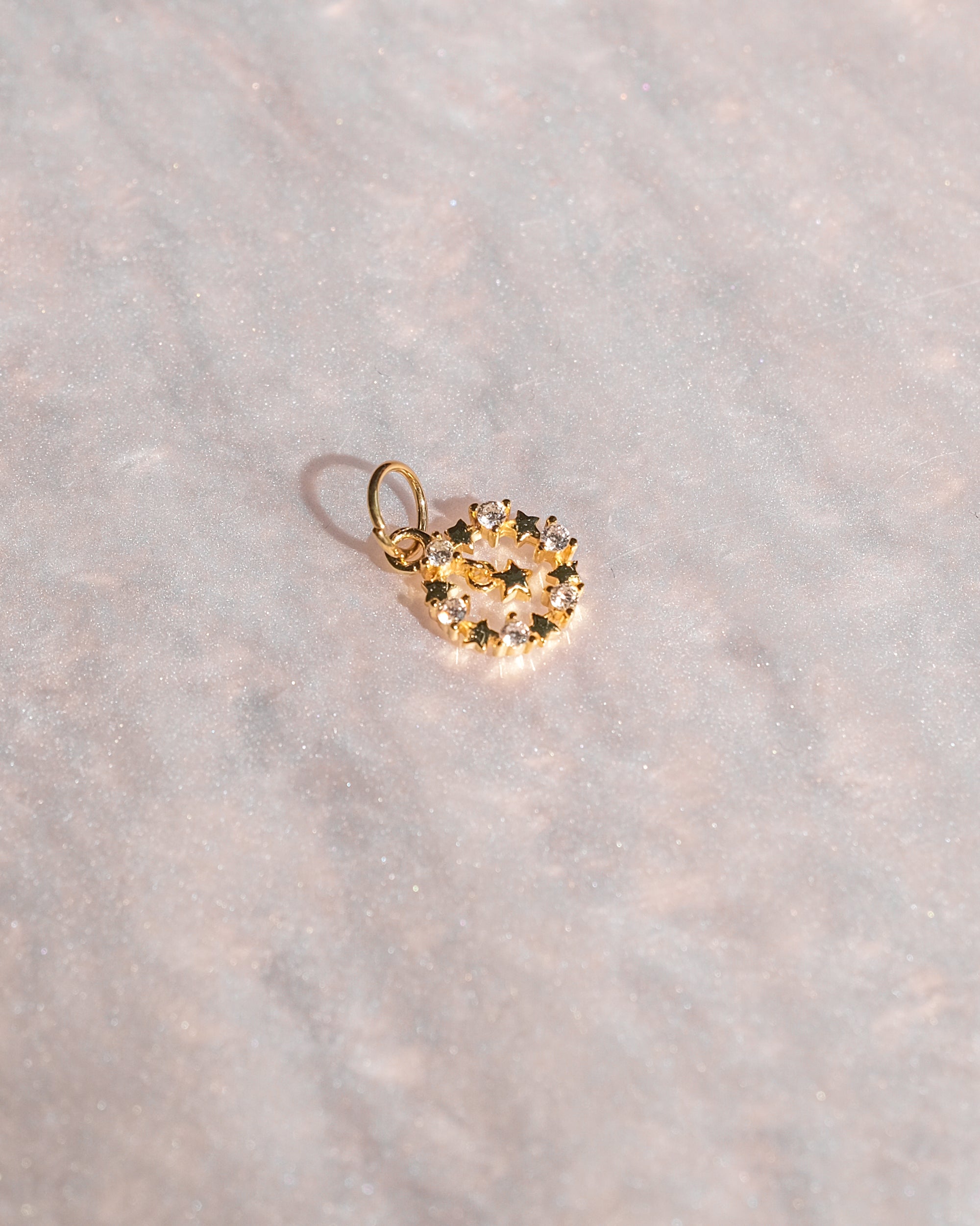 Exclusive charm with limited edition pendant designed for luxury handbags.