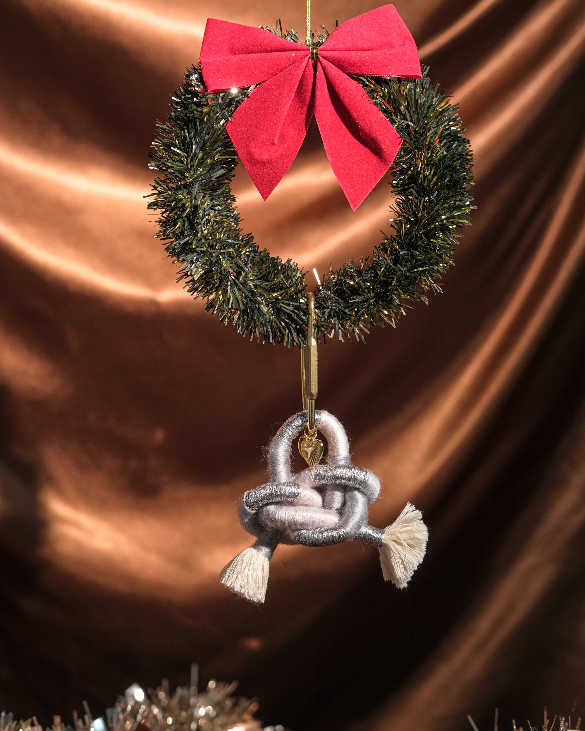 Silver Cloud Ethereal bag charm detail showing pendant etched design