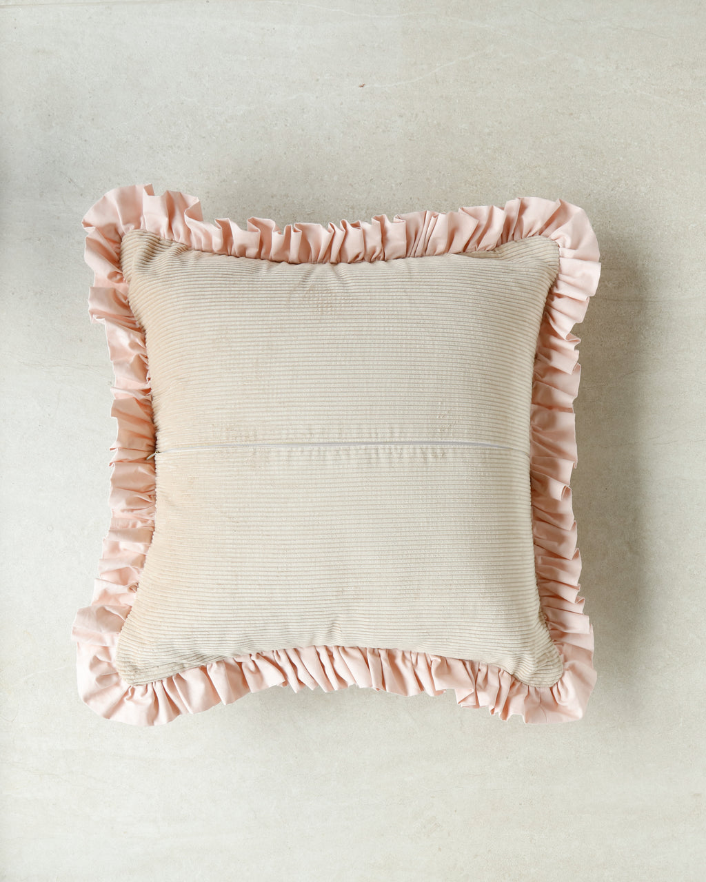 Kind Words Rosewater Cushion detail showing cushion seams and soft padding.