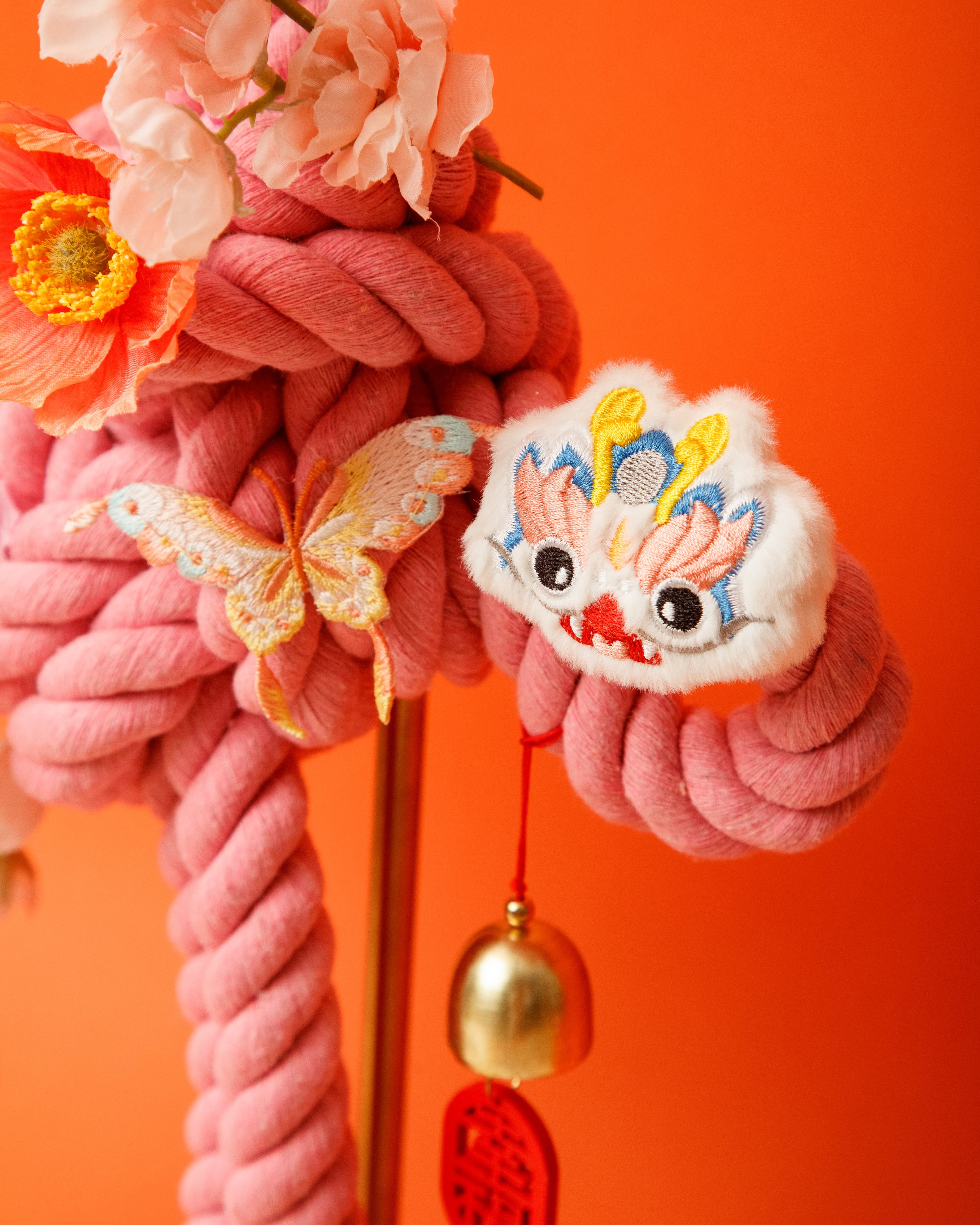 A close-up of a handmade Chinese knot, perfect as a symbolic gift for family reunions and new beginnings.
