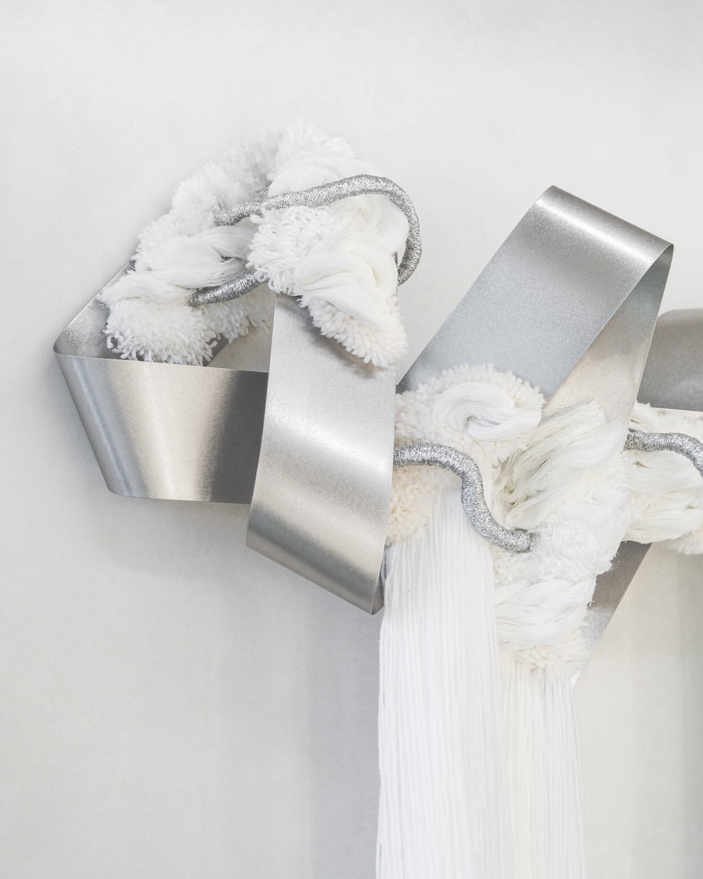 Close‑up of The Morning Glow: layered thread in warm yellow and cream, creating a glowing, textured sunrise effect.